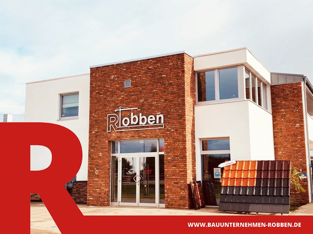 Bürogebäude und Wohnhaus des Bauunternehmens Robben Bürogebäude mit darüber liegendem Wohnhaus mit einer Außenfassade aus weißem Putz.