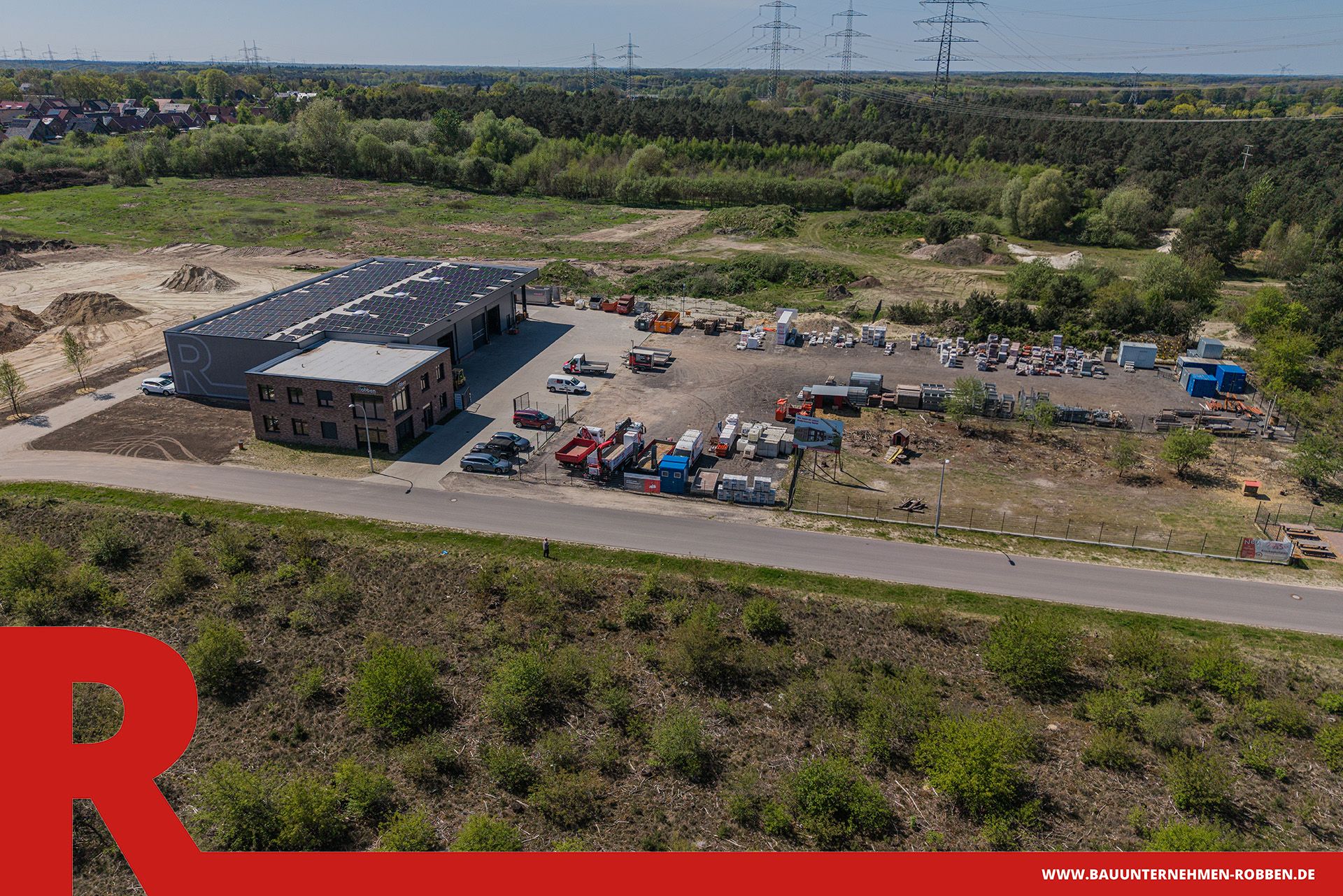 Firmensitz Bauunternehmen Robben 6 Bürogebäude mit Arbeitshalle und Lagerplatz der Bauunternehmen Robben GmbH.