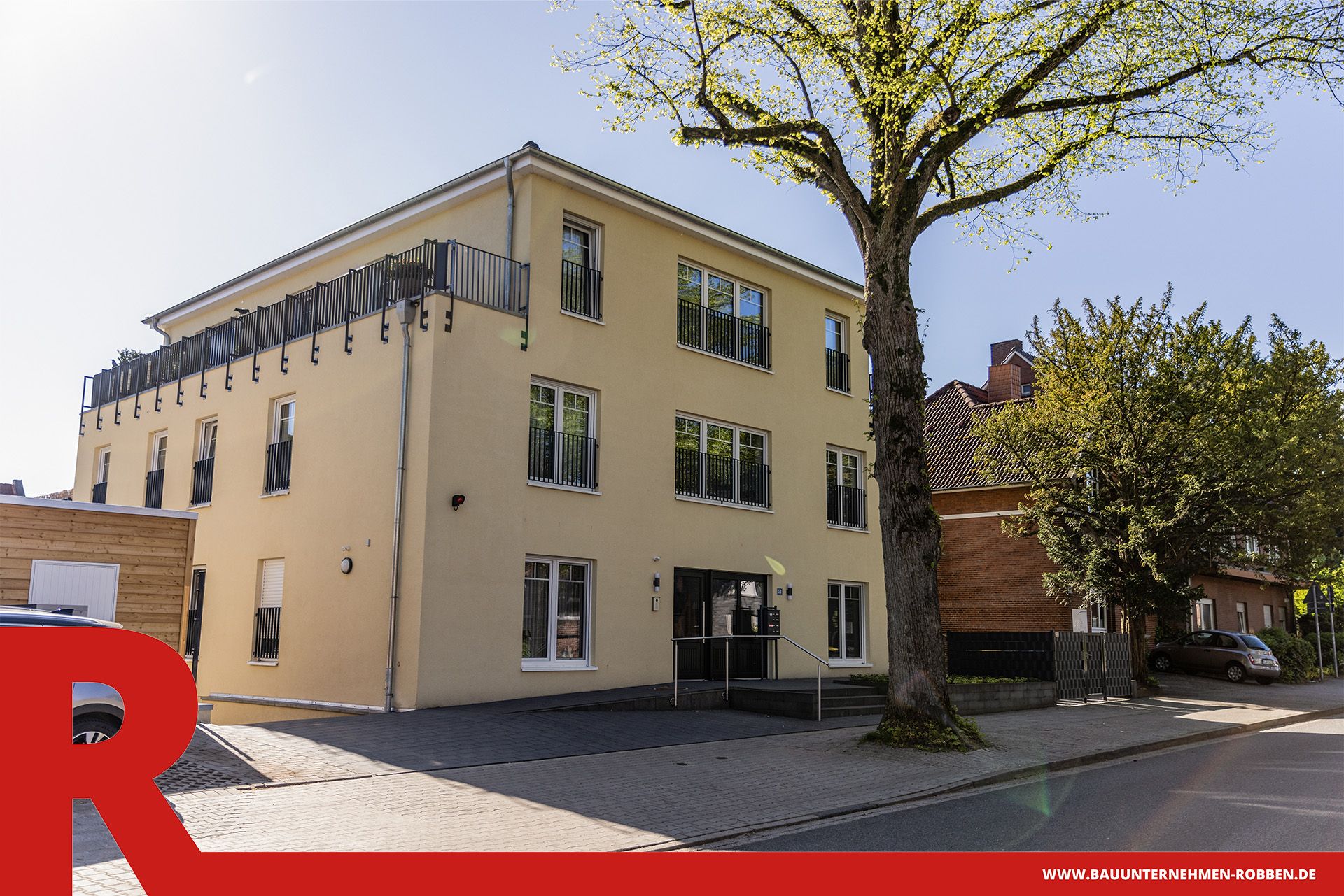 Mehrfamilienhaus mit mehreren Wohneinheiten in Gelbton.