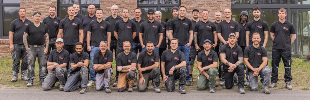 Team-Foto der Mitarbeiter des Bauunternehmen Robben.