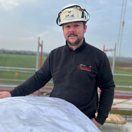Foto des Poliers Martin Schulte auf einer Baustelle.