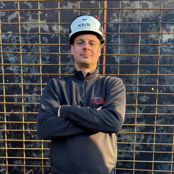 Hannes Vehring Foto des Poliers Martin Schulte auf einer Baustelle.