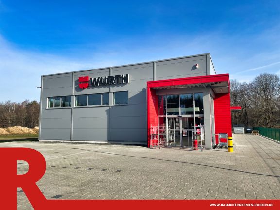 Fachmarkt eines Großhandels für Montagetechnik Gewerbebau eines grau-roten Fachmarkt für Montagetechnik.