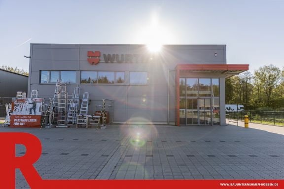 Fachmarkt eines Großhandels für Montagetechnik 4 Gewerbebau eines grau-roten Fachmarkt für Montagetechnik.