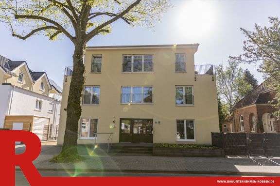 Mehrfamilienhaus mit mehreren Wohneinheiten in Gelbton.