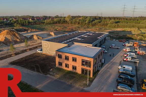 B&uuml;rogeb&auml;ude mit Arbeitshalle und Lagerplatz der Bauunternehmen Robben GmbH.